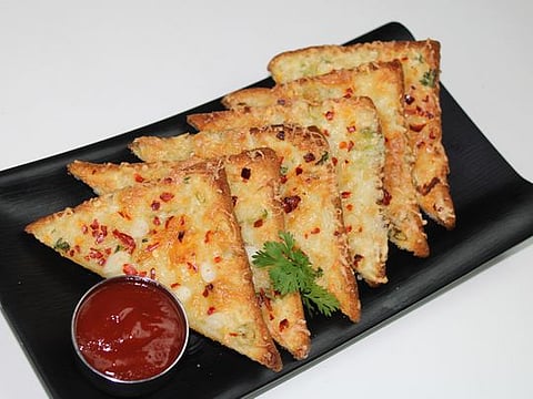 Grilled cheese sandwich with chilli flakes or chilli cheese toast