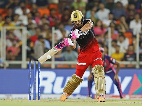 Royal Challengers Bangalore's Faf du Plessis plays a shot during the Qualifier 2 of the Indian Premier League 2022 match against Rajasthan Royals at Narendra Modi Stadium in Ahmedabad.