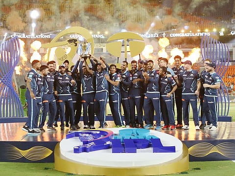 Bigger and stronger: Gujarat Titans players celebrate their maiden IPL title win in Ahmedabad.