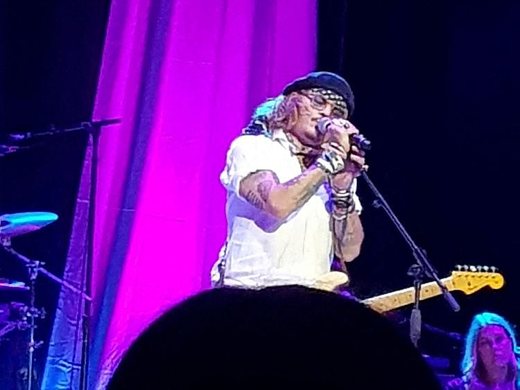 Actor Johnny Depp joins musician Jeff Beck (not pictured) on stage during a concert, in Sheffield, Britain May 29, 2022 in this picture obtained by Reuters from social media on May 30, 2022.