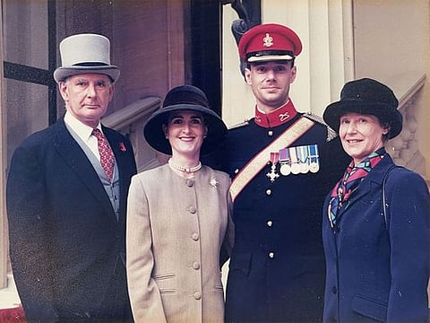 David Labouchere OBE (in uniform) with his wife Caroline, father John Labouchere and mum Mary Labouchere at the inner quadrangle of Buckingham Palace in London after the Investiture in 1997.