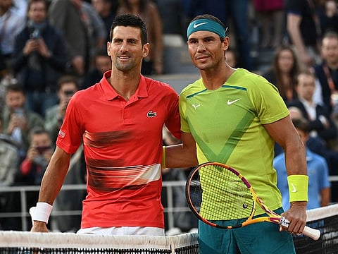 Serbia's Novak Djokovic (left) and Spain's Rafael Nadal pose before their men's quarter-final singles match on day ten of the Roland-Garros Open tennis tournament at the Court Philippe-Chatrier in Paris.