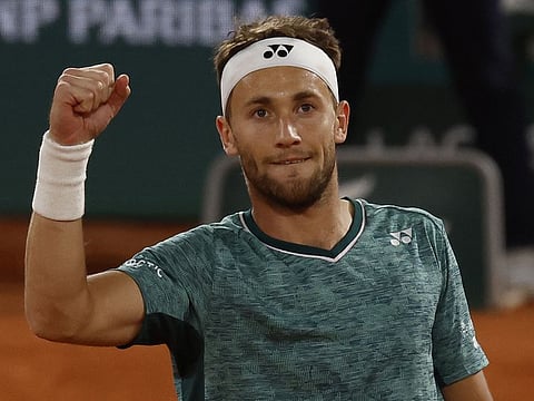 Norway's Casper Ruud celebrates after winning his quarter-final match against Denmark's Holger Rune.