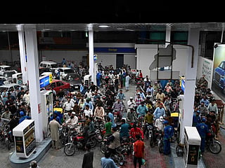 Motorists wait to fill their vehicles' tanks at a petrol station in Islamabad. The targeted subsidy will cover motorcycles, rickshaws, Qingqis and other two- and three-wheelers, as well as cars with engines of up to 800cc,