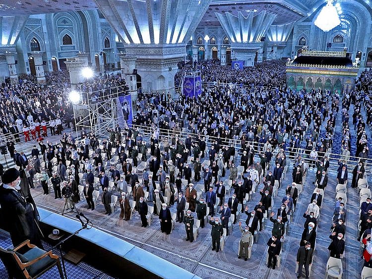 Khamenei gestures during the 33rd anniversary of the death of the leader of Iran's 1979 Islamic revolution, Ayatollah Ruhollah Khomeini, at Khomeini's shrine in southern Tehran on June 4, 2022.