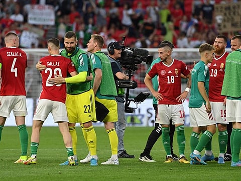 Hungary's players celebrate after the 1-0 win over England in the UEFA Nations League at the Puskas Arena in Budapest, Hungary.