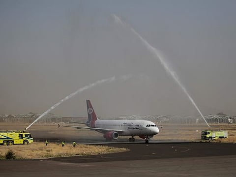 A Yemen Airways plane, the first commercial flight in six years from Sana'a, is greeted with a water spray salute at the Sana'a international airport, part of a truce in the county's grinding civil war, in a May, 16 photo.