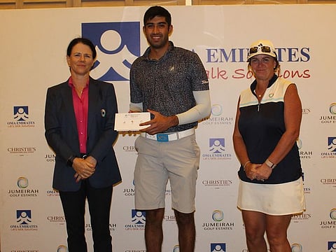 Winner of the Gross Division Yash Majmudar (middle), with JGE Lady Captain Sheila McIlroy (left) and Vice Lady Captain Evelyn Downham.