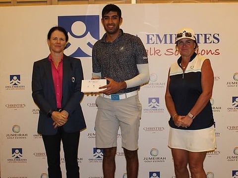 Winner of the Gross Division Yash Majmudar (middle), with JGE Lady Captain Sheila McIlroy (left) and Vice Lady Captain Evelyn Downham.