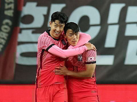 South Korea's Son Heung-min (left) celebrates with Hwang Hee-Chan after they beat Chile 2-0.