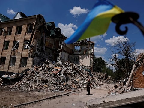 Press officer Olexii Mischenko shows a destroyed city administration building in Bashtanka, Mykolaiv region, as Russia's attack on Ukraine continues, Ukraine June 9, 2022.