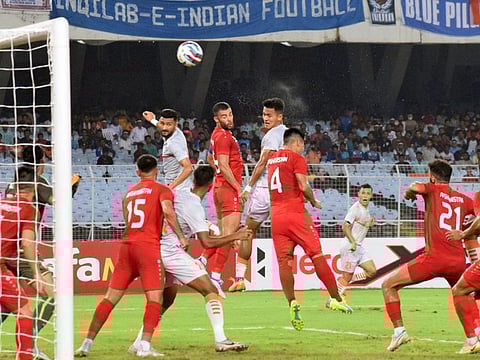 Indian and Afghanistan players are in action during the second match of the third round of AFC Asian Cup qualifiers, at Salt Lake Stadium, in Kolkata.