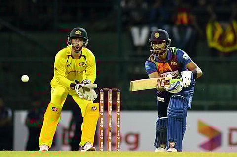 Sri Lanka's Captain Dasun Shanaka (right) plays a shot during the third and final Twenty20 international match against Australia at the Pallekele International Cricket Stadium in Kandy.