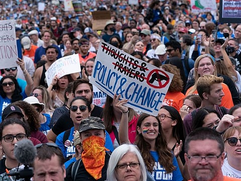 People participate in the second March for Our Lives rally in support of gun control Saturday, June 11, 2022, in Washington. The rally is a successor to the 2018 march organized by student protestors after the mass shooting at a high school in Parkland, Fla.