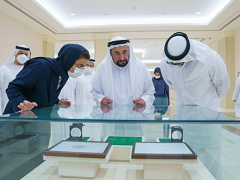 His Highness Dr Sheikh Sultan bin Muhammad Al Qasimi (centre) and Noura bint Mohammed Al Kaabi (L), Minister of Culture and Youth, at Dr Sultan Al Qasimi Centre in Sharjah