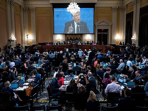 File: A video of former President Donald Trump speaking is shown on a screen as the House select committee tasked with investigating the January 6th attack on the Capitol hold a hearing on Capitol Hill , in Washington, U.S. June 13, 2022. 