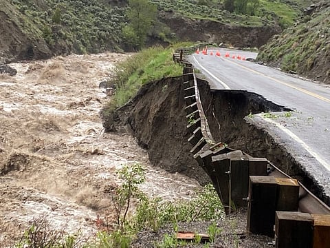 High water levels in the Gardner River erode Yellowstone National Park's North Entrance Road, where the park was closed due to heavy flooding, rockslides, extremely hazardous conditions near Gardiner, Montana.