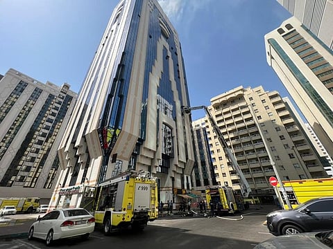 Emergency response teams at the building in Abu Dhabi after a fire broke out in the afternoon today. 