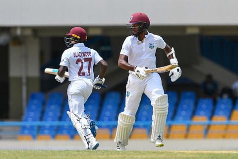 Kraigg Brathwaite (right) and Jermaine Blackwood of West Indies in action during the 2nd day of the 1st Test against Bangladesh at Vivian Richards Cricket Stadium in North Sound, Antigua and Barbuda.