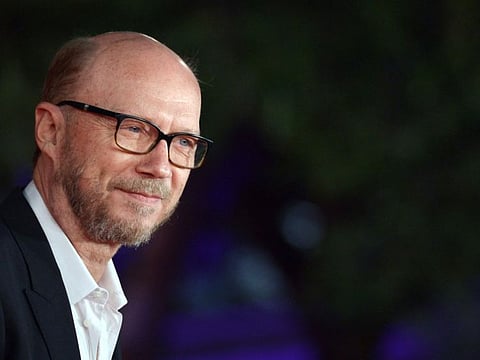 (FILES) In this file photo taken on October 16, 2015 Canadian film director Paul Haggis poses on the red carpet