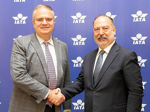 Mehmet Tevfik Nane (right) with outgoing IATA chair Robin Hayes.