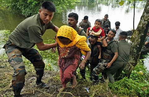 Army personnel rescue flood-affected victims at Hajo, in Kamrup on Monday, Jun 20, 2022.