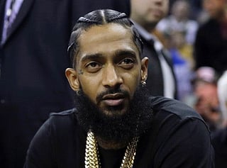 Woman who drove man who killed rapper Nipsey Hussle testifies