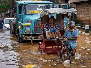 Photos: India, Bangladesh floods destroy homes, lives