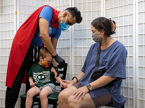 Miller Mensch, 4, receives a COVID-19 vaccine for children under five years old at Skippack Pharmacy in Schwenksville, Pennsylvania, June 21, 2022. The US on Saturday opened COVID-19 vaccines to infants, toddlers and preschoolers. The shots will become available this week, expanding the nation’s vaccination campaign to children as young as 6 months. 