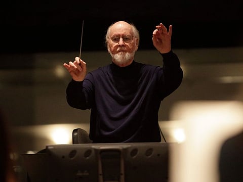 This 2017 photo released by Lucasfilm Ltd shows John Williams, a five-time Oscar-winning composer.