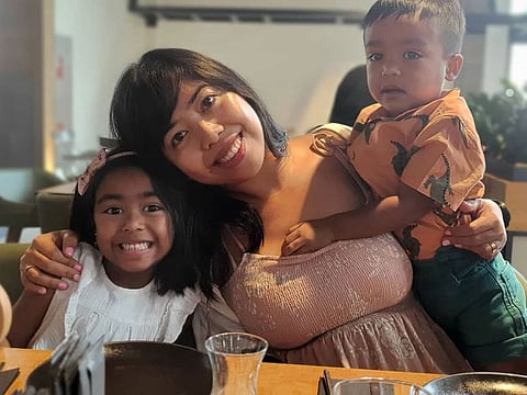 Elida Loresca-Shahabuddin with her children.