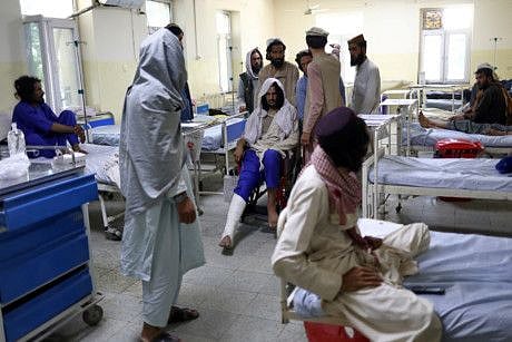 Afghans, who were injured in the recent earthquake, receive treatment at a hospital ward in Sharana, Afghanistan, June 24, 2022.