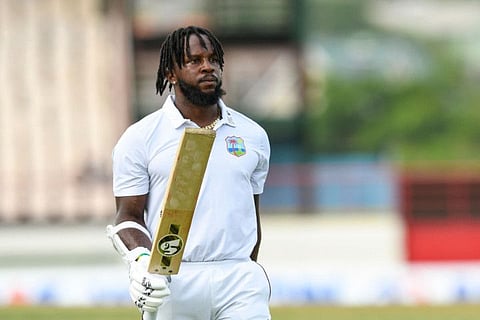 Kyle Mayers, of West Indies, waves his bat to supporters at the end of the second day of the 2nd Test against Bangladesh at Darren Sammy Cricket Ground in Gros Islet, Saint Lucia.