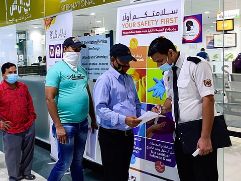 Indian expats at a Passport Seva Camp organised by the Consulate General of India at one of the 12 BLS International Service Centres in Dubai on Sunday. 