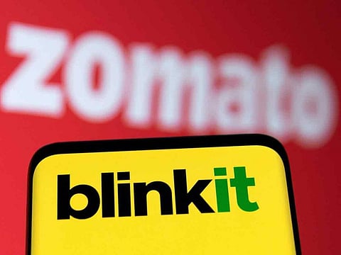 Blinkit and Zomato logos are seen in this illustration. 