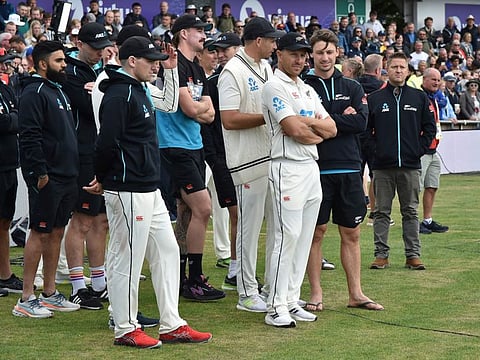 New Zealand players attend the presentation ceremony after their loss on the fifth day of the third cricket Test against England at Headingley in Leeds, England. 