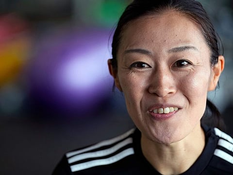 Yoshimi Yamashita of Japan, one of three women picked to be head referees at the men's World Cup, speaks at JFA YUME Field in Chiba, near Tokyo, on Monday.