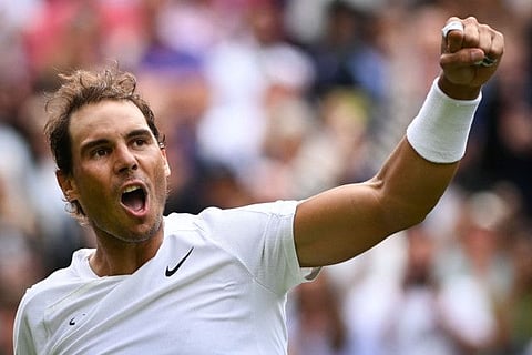 Spain's Rafael Nadal celebrates after winning against Argentina's Francisco Cerundolo in the men's singles first round at 2022 Wimbledon Championships at The All England Tennis Club on Tuesday.