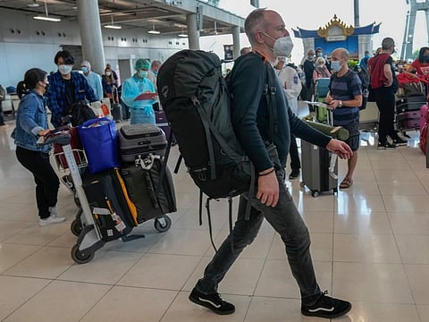 Tourists arrive at Suvarnabhumi International Airport in Bangkok in a file photo. In January, Saudi Arabia and Thailand agreed to fully restore diplomatic ties between the two countries and to exchange ambassadors for the first time in around 32 years.