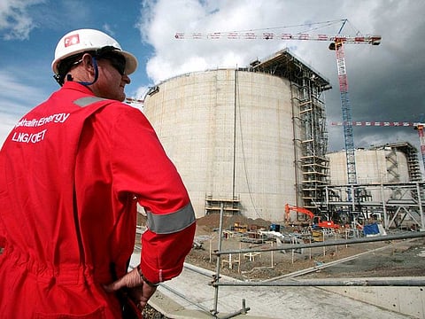 An employee of Sakhalin Energy stands at the Sakhalin-2 project's  liquefaction gas plant in Prigorodnoye, about 70 km south of Yuzhno-Sakhalinsk, October 13, 2006. 