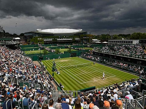 General view of Netherlands' Tim van Rijthoven in action during his third round match against Georgia's Nikoloz Basilashvili, at the All England Lawn Tennis and Croquet Club, Wimbledon, London.  