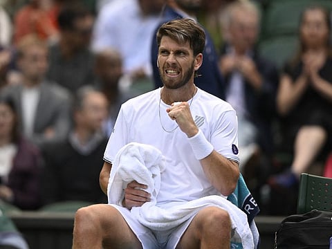 Britain's Cameron Norrie reacts during his third round match against Steve Johnson of the US.