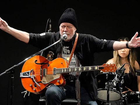 Canadian rock legend Randy Bachman sings as he plays with his reunited Gretsch guitar during the Lost and Found Guitar Exchange Ceremony Friday, July 1, 2022, at the Canadian Embassy in Tokyo.
