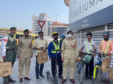 Dubai Police officers during awareness campaign about safety of cyclists and e-scooter riders in Dubai. 
