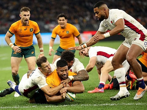 Australia's Folau Fainga’a scores a try during their rugby Test match against England at the Optus Stadium in Perth on Saturday.