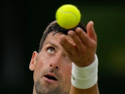 Serbia's Novak Djokovic serves to Tim van Rijthoven of the Netherlands during a men's fourth round in Wimbledon on Sunday.