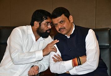 Maharashtra Chief Minister Eknath Shinde interacts with state Deputy CM Devendra Fadnavis at the first joint meeting with BJP and Shiv Sena (Shinde faction) MLAs before the Special Session of Maharashtra Assembly, at Taj Hotel, in Mumbai on Saturday. 