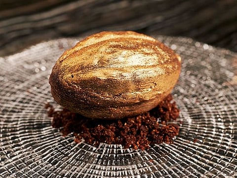 Gold-dusted passionfruit caramel and mousse cocoa bean