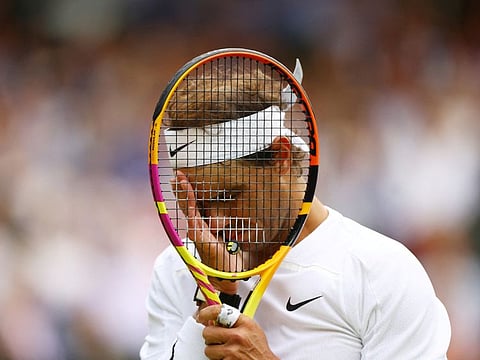 Spain's Rafael Nadal reacts during his  Wimbledon quarter-final against Taylor Fritz of the US in London on Wednesday.
