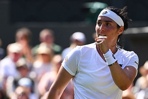Tunisia's Ons Jabeur celebrates after defeating Germany's Tatjana Maria in the Wimbledon women's singles at The All England Tennis Club on Thursday.